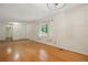 Spacious living room with hardwood floors and ample natural light, creating a cozy atmosphere at 1960 Oak Leaf Sw Ct, Marietta, GA 30008