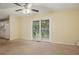 Cozy living space with sliding glass doors leading to an outdoor area, perfect for relaxation at 1960 Oak Leaf Sw Ct, Marietta, GA 30008
