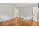 Bright and airy main bedroom, featuring hardwood floors and multiple closets for ample storage at 1960 Oak Leaf Sw Ct, Marietta, GA 30008