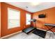 Bonus room with weights and windows for natural light at 4424 English Loop, Stonecrest, GA 30038