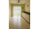 Sunlit dining area with classic cabinets and a door leading to the outdoors at 45 Avery Drive, Covington, GA 30016