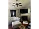 Inviting living room with a fireplace, flat screen, and comfortable seating at 45 Avery Drive, Covington, GA 30016
