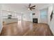 Spacious living room features hardwood floors, fireplace, and an open layout at 826 Bentley Dr, Fairburn, GA 30213