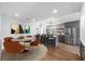 Dining room with modern light fixtures and a view into the open kitchen area at 957 Sharon Se Cir, Smyrna, GA 30080