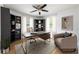 Bright home office with built-in shelves and comfortable seating area at 957 Sharon Se Cir, Smyrna, GA 30080
