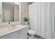 This bathroom features a large vanity, a mirror, a toilet, and a shower at 6245 Hampton Golf Club Dr, Cumming, GA 30041