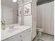 Bathroom featuring a vanity, a large mirror, and a shower at 6245 Hampton Golf Club Dr, Cumming, GA 30041