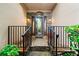 Inviting front entrance with stone accents, stylish glass door, and manicured landscaping at 120 Bent Creek Dr, Woodstock, GA 30189