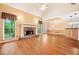 Spacious living room with hardwood floors and a stunning stone fireplace at 120 Bent Creek Dr, Woodstock, GA 30189