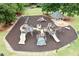 Community playground with slides, climbing structures, and a cushioned surface at 120 Bent Creek Dr, Woodstock, GA 30189
