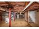 Unfinished basement with exposed ductwork offers great potential for renovation or additional storage at 2702 Rollingwood Se Ln, Atlanta, GA 30316