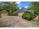 Long driveway leading to a spacious three car garage adjacent to the well maintained home at 362 Clyde Ct, Mcdonough, GA 30252