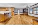 Open kitchen features hardwood floors, a breakfast bar, and lots of cabinet space at 362 Clyde Ct, Mcdonough, GA 30252