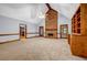 Spacious living area with vaulted ceilings, fireplace, built-ins, and ample natural light at 362 Clyde Ct, Mcdonough, GA 30252