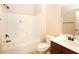 Clean bathroom with a tub/shower combo, white toilet, and dark wood vanity providing a practical space at 40 Oakwood Dr, Covington, GA 30016