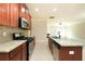 Stylish kitchen with stainless steel appliances, granite countertops, and ample cabinet space at 40 Oakwood Dr, Covington, GA 30016