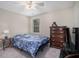 Cozy bedroom featuring carpet floors, natural light and large dresser at 1907 S Van Wert Rd, Villa Rica, GA 30180