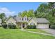 Charming single-Gathering home with well-manicured lawn, mature trees, and attached two car garage at 1907 S Van Wert Rd, Villa Rica, GA 30180