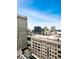 High-rise buildings and a clear blue sky make up this beautiful city view at 3040 Peachtree Nw Rd # 1501, Atlanta, GA 30305