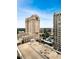 High-rise buildings surrounded by greenery with a bright blue sky at 3040 Peachtree Nw Rd # 1501, Atlanta, GA 30305