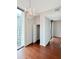 Bedroom with chandelier and large window at 3040 Peachtree Nw Rd # 1501, Atlanta, GA 30305