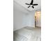 Bedroom with carpet, ceiling fan, neutral walls, and access to ensuite bathroom and closet at 3040 Peachtree Nw Rd # 1501, Atlanta, GA 30305
