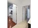 Hallway that opens up to the kitchen and to the walk-in closet at 3040 Peachtree Nw Rd # 1501, Atlanta, GA 30305