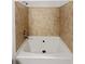 Close up on tub shower combo with neutral colored tiles at 3040 Peachtree Nw Rd # 1501, Atlanta, GA 30305