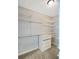 Spacious walk-in closet with multiple shelves and storage options at 3040 Peachtree Nw Rd # 1501, Atlanta, GA 30305