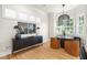 Dining room with hardwood floors, decorative mural wallpaper, and modern chandelier at 5968 Reddington Way, Sandy Springs, GA 30328