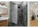 This walk-in shower features a modern shower head, glass door, and a beautiful tile design at 5968 Reddington Way, Sandy Springs, GA 30328