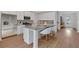 Bright kitchen island with stainless steel appliances and sleek cabinetry at 61 Colonial Terrace, Villa Rica, GA 30180