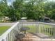 Cozy balcony with a table and chairs, perfect for enjoying outdoor space at 6701 Knollwood Cir, Douglasville, GA 30135