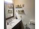 Bathroom featuring a sink, shelving, and decor at 6701 Knollwood Cir, Douglasville, GA 30135