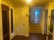 Home entryway featuring wood floors and stairs leading to the upper level at 6701 Knollwood Cir, Douglasville, GA 30135