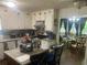 Well-equipped kitchen with updated appliances and island at 6701 Knollwood Cir, Douglasville, GA 30135