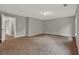 Finished basement with carpet flooring and neutral paint at 1707 Taylor Ave, Atlanta, GA 30344