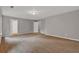 Finished basement with carpet flooring and neutral paint at 1707 Taylor Ave, Atlanta, GA 30344