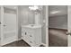 Bathroom with white vanity and access to bathtub at 1707 Taylor Ave, Atlanta, GA 30344