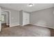 Carpeted bedroom with large closet and neutral paint at 1707 Taylor Ave, Atlanta, GA 30344