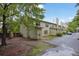 Backyard of the property with beautiful landscaping, a small fence, and a private entrance at 1707 Taylor Ave, Atlanta, GA 30344