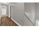 View of the hallway and stairway with hardwood flooring at 1707 Taylor Ave, Atlanta, GA 30344
