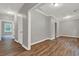 Living room with hard wood floors and neutral paint at 1707 Taylor Ave, Atlanta, GA 30344
