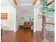 Warm entryway with gleaming hardwood floors leading to a cozy living room at 2205 Waters Ferry Dr, Lawrenceville, GA 30043