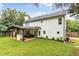 Exterior view of the home showing backyard and patio at 2205 Waters Ferry Dr, Lawrenceville, GA 30043