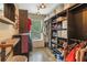 Spacious walk-in closet with shelves and storage at 2205 Waters Ferry Dr, Lawrenceville, GA 30043