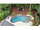 Bird's-eye view of a backyard with a custom pool, hot tub, and lounge area at 2714 Twin Leaf Trl, Marietta, GA 30062