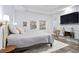 Bedroom with stone fireplace, white decor, and access to an outdoor area at 2714 Twin Leaf Trl, Marietta, GA 30062
