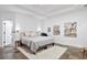 This bedroom boasts unique tile flooring, recessed lighting, and neutral decor at 2714 Twin Leaf Trl, Marietta, GA 30062