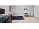 Functional bedroom with desk, and chair providing a cozy place to study and relax at 2714 Twin Leaf Trl, Marietta, GA 30062